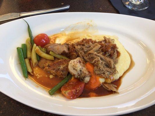 Pan roasted game hen served with polenta and fresh veggies