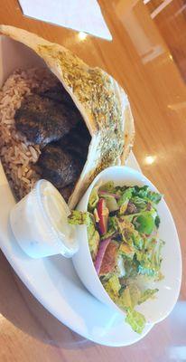 Kafta kabob entree with fatush salad and tzatziki sauce