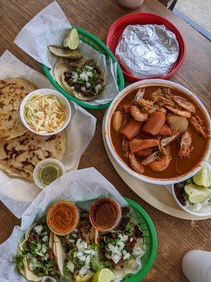 caldo de camerones, tacos, and pupusas