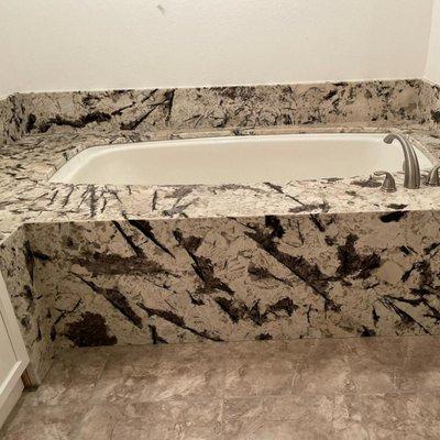 Fine Countertops - 239-245-1338 - bathtub https://finecountertops.com/