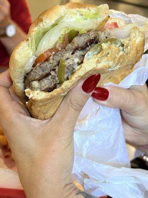 The Philly cheeseburger. She took a bite before I got the picture, but she could t help it. It smelled good and she was drooling