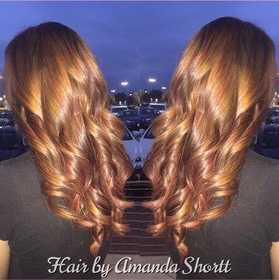 Fall balayage with reds and warm caramel tones