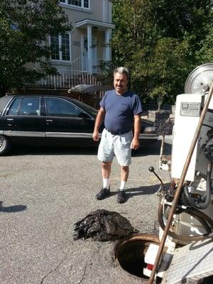 While jet rodding, found a sealed bag of concrete wedged in a why connection preventing proper flow on a storm sewer line.