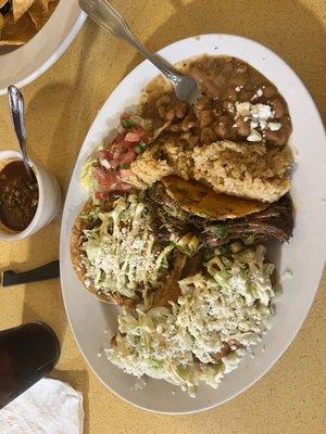 A combo plate - made up by recommendation of Kenny (wait staff) - with a Tostada, an enchilada and the Birria Taco.