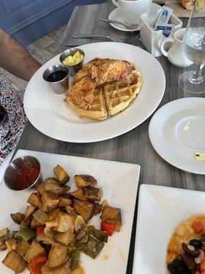 Chicken and waffles and side of home fries