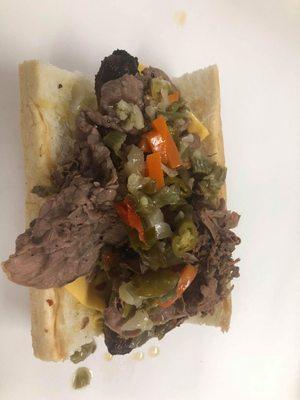 Italian Beef Combo comes with American cheese, giardiniera peppers & deep.