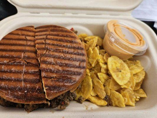 Sloppy Cubano Picadillo with plantain chips + their delicious side sauce