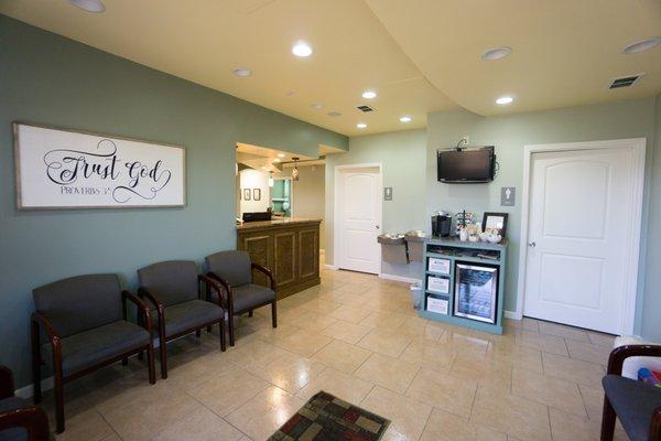 Our spacious lobby area complete with coffee and water while you wait!