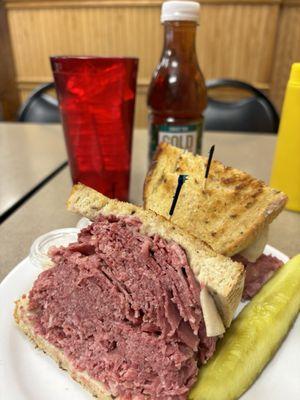 Corned Beef Sandwich and pickle spear