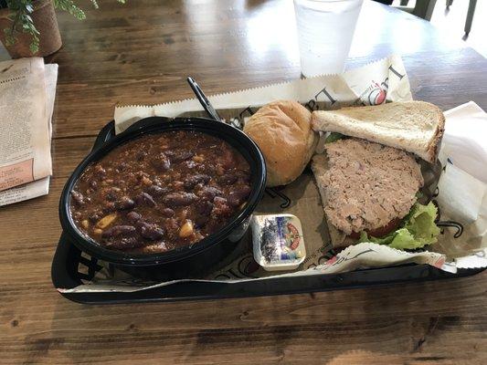 Hearty and delicious turkey chili and half a tuna sandwich.