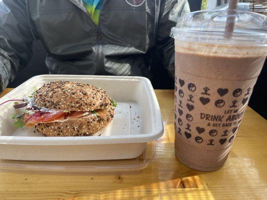 Bagel with lox. Chocolate smoothie.