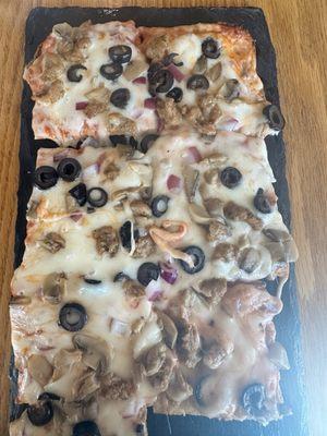 2nd chance coffee and music flatbread pizza with mushrooms, black olives, sausage and onions. And ohhhh the cheese!!!! Delicious!