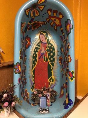 A beautiful bathtub Lady of Guadalupe inside the restaurant.