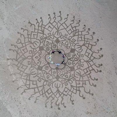 Celebrating beach mandala creation!