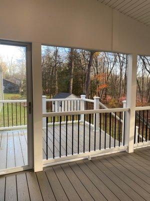 Screened in porch with open deck piece