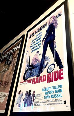 Several posters from older films adorn the walls in the place.