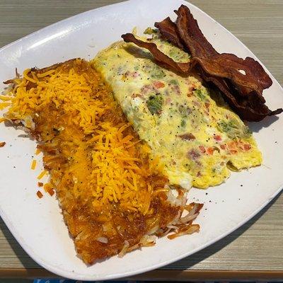 Baja Omelette w/ crispy bacon and crispy hash browns w/ cheese