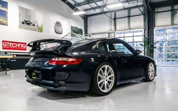 A Porsche GT3 from Cats Exotics sits inside NWAS awaiting an Enthusiast exterior detail.