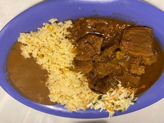 Beef stew with rice and beans. Full of flavor!