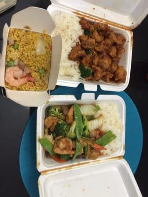 House fried rice, orange chicken, mixed vegetables with shrimp. They were all delicious! :)