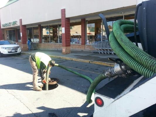 Preventive Maintenance: Cleaning grease traps at Waldbaum's Shopping Center in Pleasant Plains, Staten Island, New York.