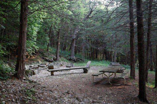 The "Grotto" which is a rentable fire-pit area for groups!