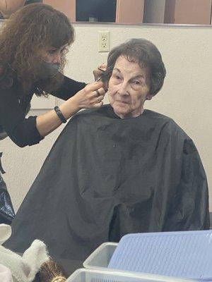 Grandma getting finishing touches