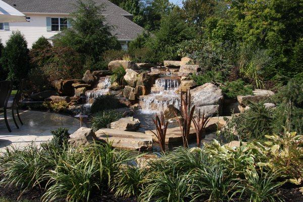 Water fall water feature with plantings