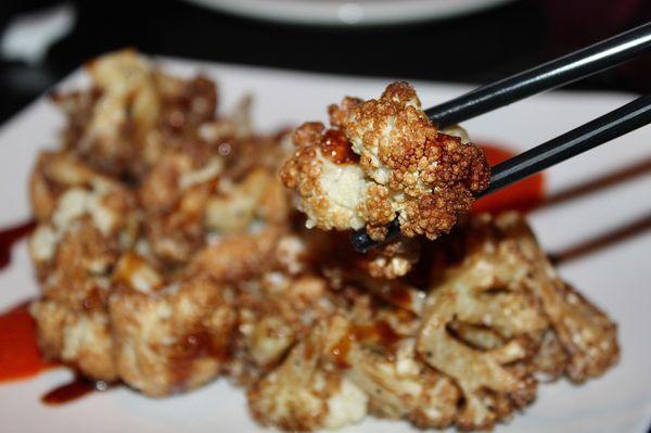 The Fried Cauliflower made with parmesan, and fire roasted red bell pepper purée.