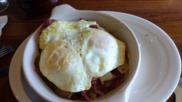 Corn beef hash with 2 over medium eggs and white toast is just awesome.