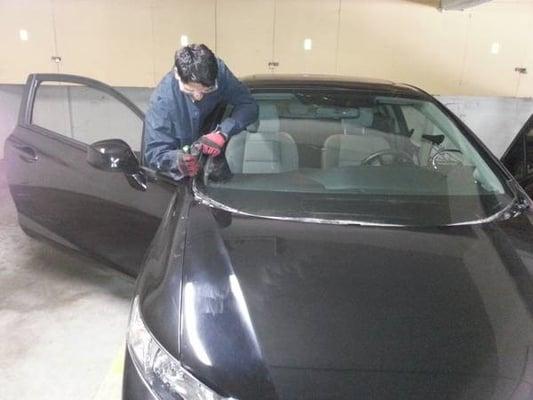 Here is Tony working on my car. He provides quality work at a very competitive price. And a quick service too:-)