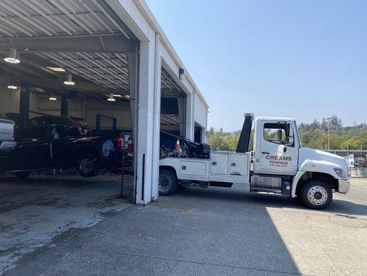 Nate getting my Chevy into the shop.