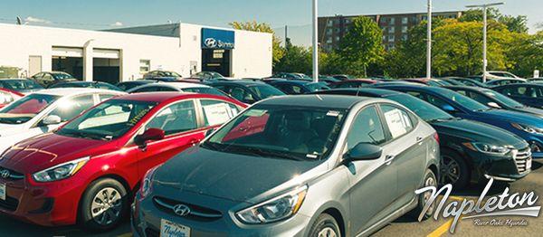 Hyundai accent shown with our service entrance in the background (708)868-6500 | RiverOaksHyundai.com