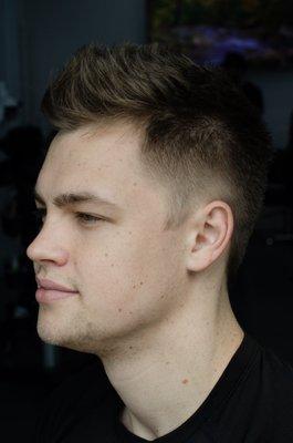 Clean but loose feel haircut.