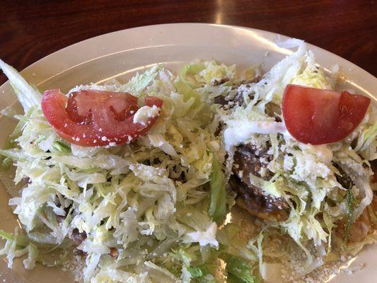 Sopes 2 comes with order one Carnitas the other Birria