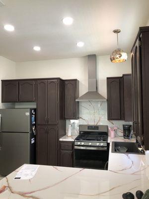 Kitchen canned lights and pendant light over sink