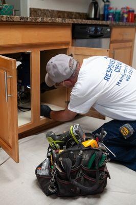 Garbage disposal installation, garbage disposal replacement, kitchen sink leak, leak under kitchen sink.