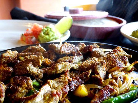 Steak Fajitas, loaded with seasonal vegetables.