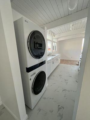 restored laundry room after fire.