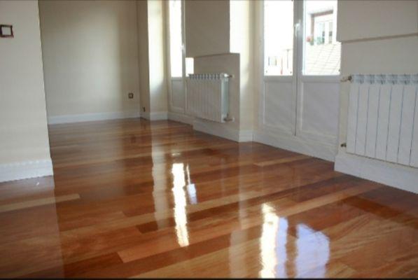 Freshly polished real wood floors glistening