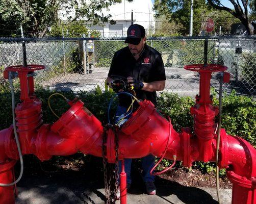 We service fire sprinklers and backflows. Testing this big backflow for a new customer.