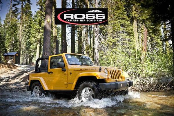 Wrangler showing off its traditional water fording capabilities.