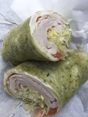 Turkey wrap with cheese.