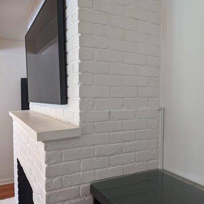 Frame TV on brick with wire concealment