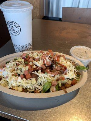 Chicken salad bowl with a side of brown rice and a half and half tea