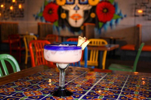 Behold our Tropical Margarita! This margarita is sure to make your tastebuds dance. It is the perfect margarita for any occasion!