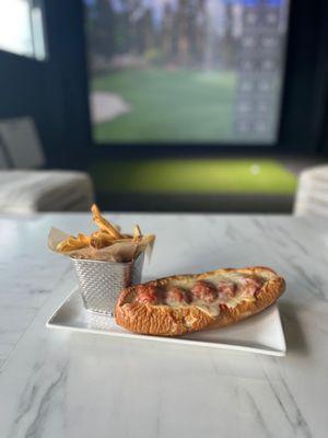 Paulie's meatball sub is getting strong reviews.  Notice the simulator in the background!  It has over 14 sports for you to enjoy!