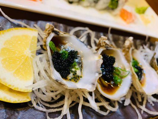 Raw Oyster served with Uni Japanese / Sea urchin