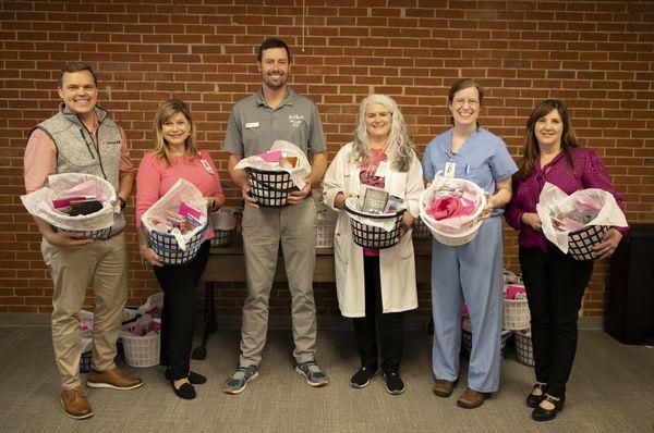 Bulldog Kia - Breast Cancer Awareness Month baskets to patients at Piedmont Athens Regional