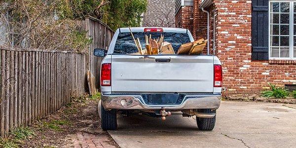 Truck for yard waste, debris, and other items that need hauling away